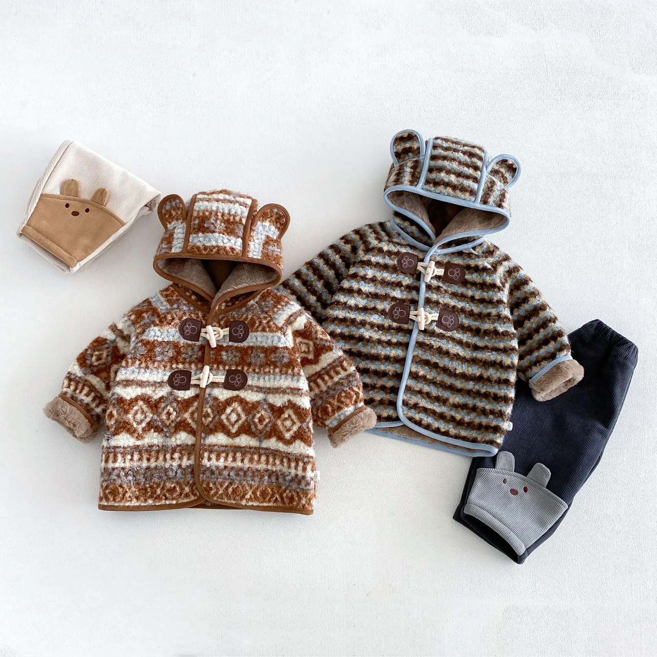LittleWarm – Hyggelig og stilfuld – Vinterfrakke med Fair Isle-mønster