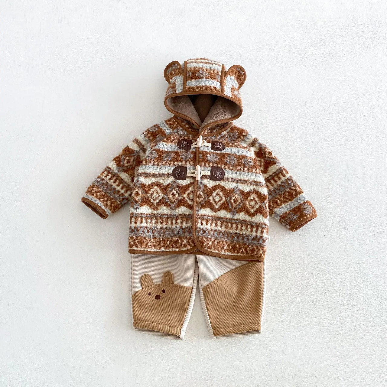 LittleWarm – Hyggelig og stilfuld – Vinterfrakke med Fair Isle-mønster