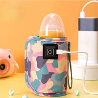 Thumbnail for Nurtura – Varm & på farten – Bærbar babyflaskevarmer