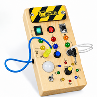Thumbnail for TinyTech – Busy Board af træ med lys og kontakter – pædagogisk legetøj