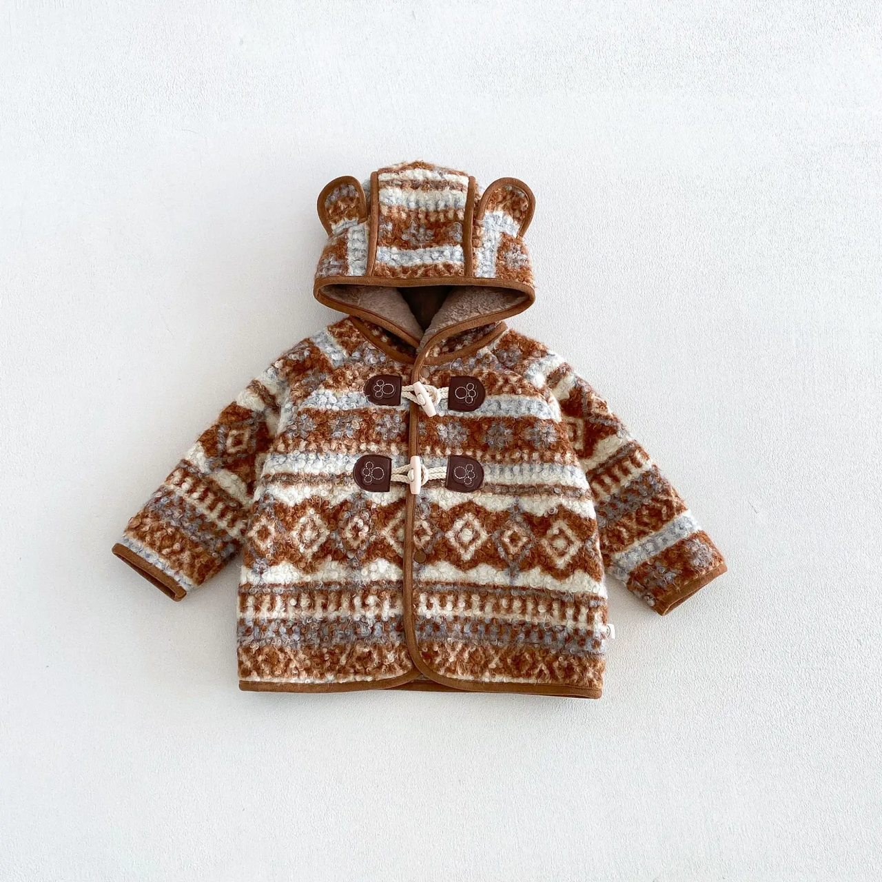 LittleWarm – Hyggelig og stilfuld – Vinterfrakke med Fair Isle-mønster