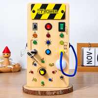 Thumbnail for TinyTech – Busy Board af træ med lys og kontakter – pædagogisk legetøj