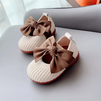 Thumbnail for SweetBow – Sødt & praktisk – Strikkede babysko med sommerfuglesløjfe