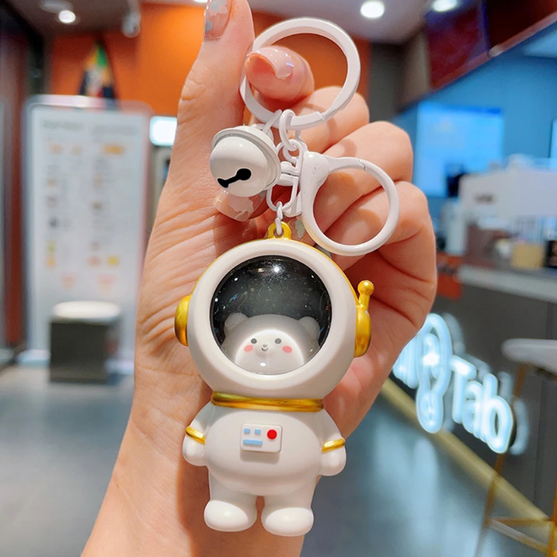 Glowing Astronaut Charm – Sød & lysende – Astronaut-taskehænger