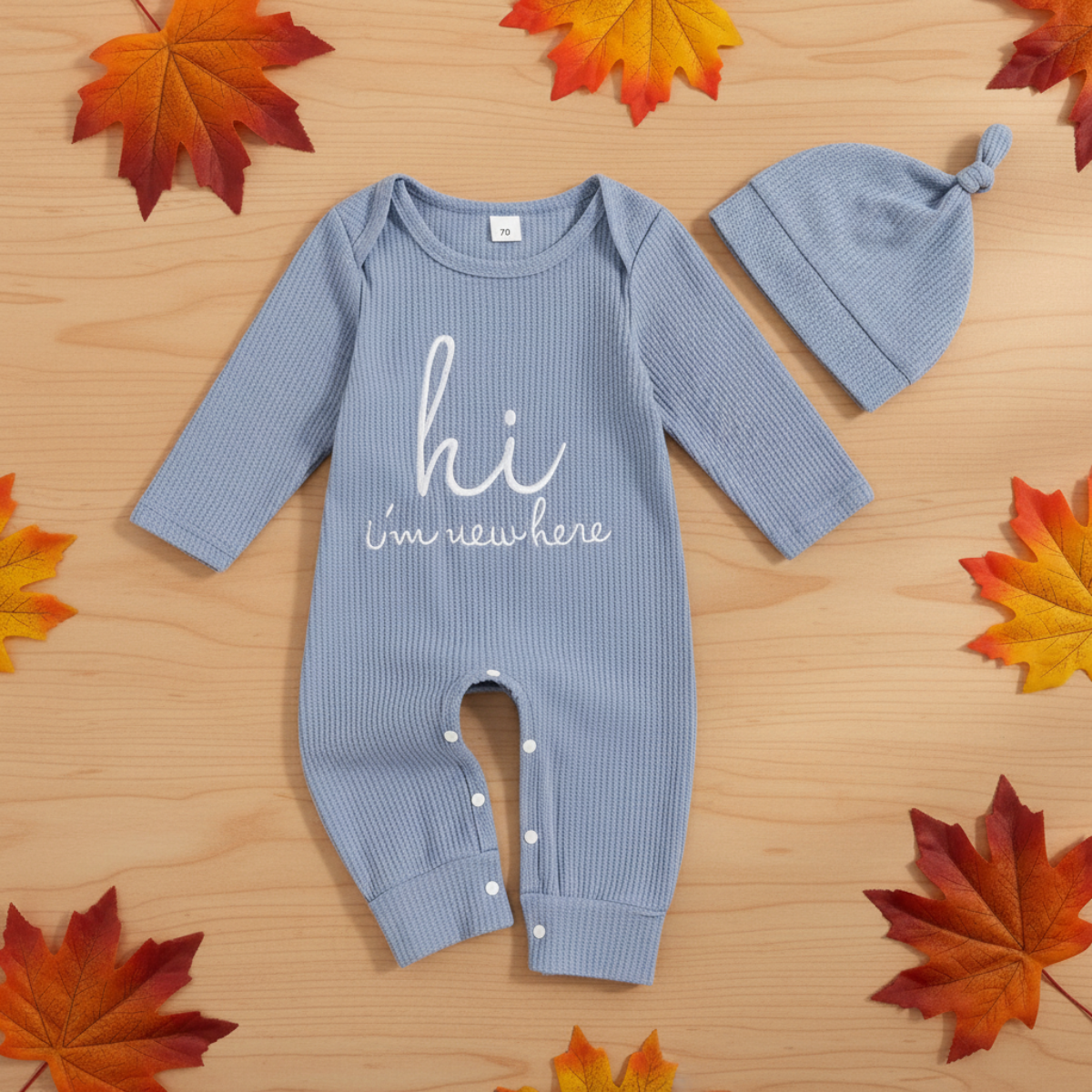 CuddleBaby – Hej, jeg er ny her – Sæt med baby-jumpsuit og hue