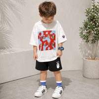 Thumbnail for TinyTrend – Afslappet og stilfuldt – Børnet-shirt med farverigt printmønster