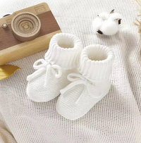 Thumbnail for SnuggleSteps – Varme og bløde – strikkede babysko