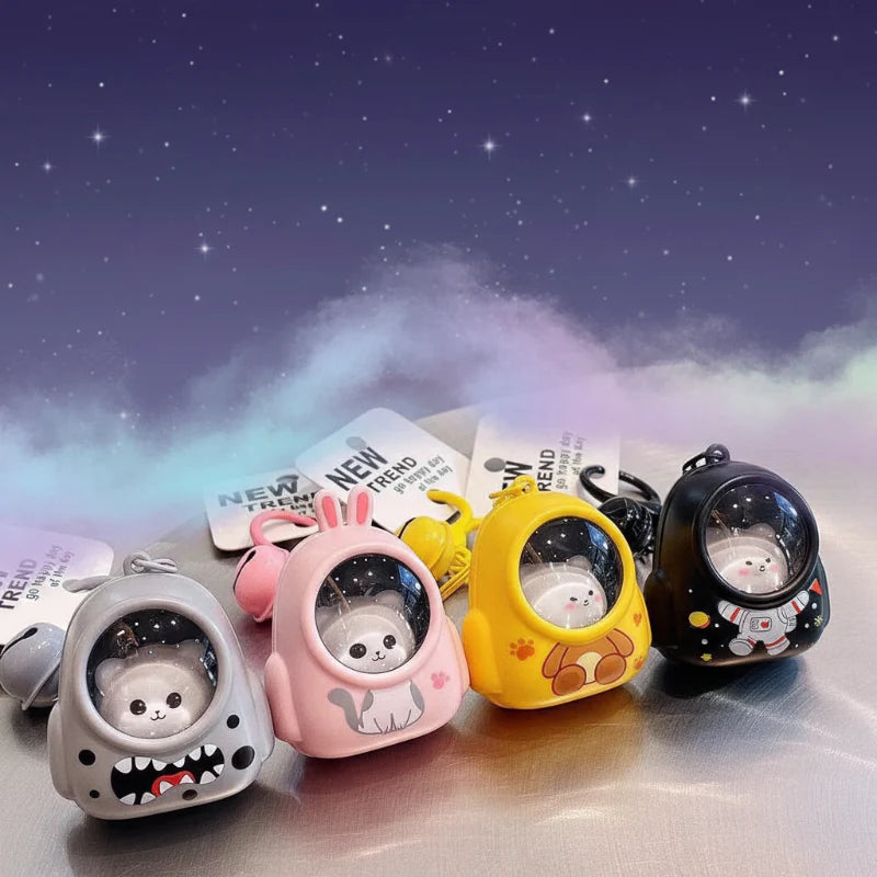 Glowing Astronaut Charm – Sød & lysende – Astronaut-taskehænger