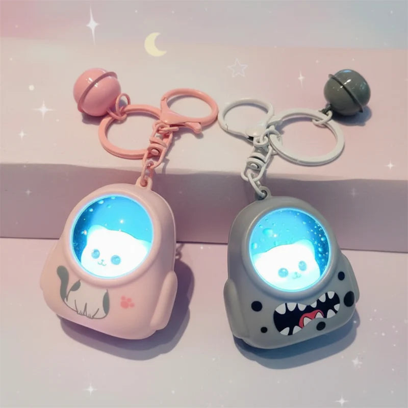 Glowing Astronaut Charm – Sød & lysende – Astronaut-taskehænger